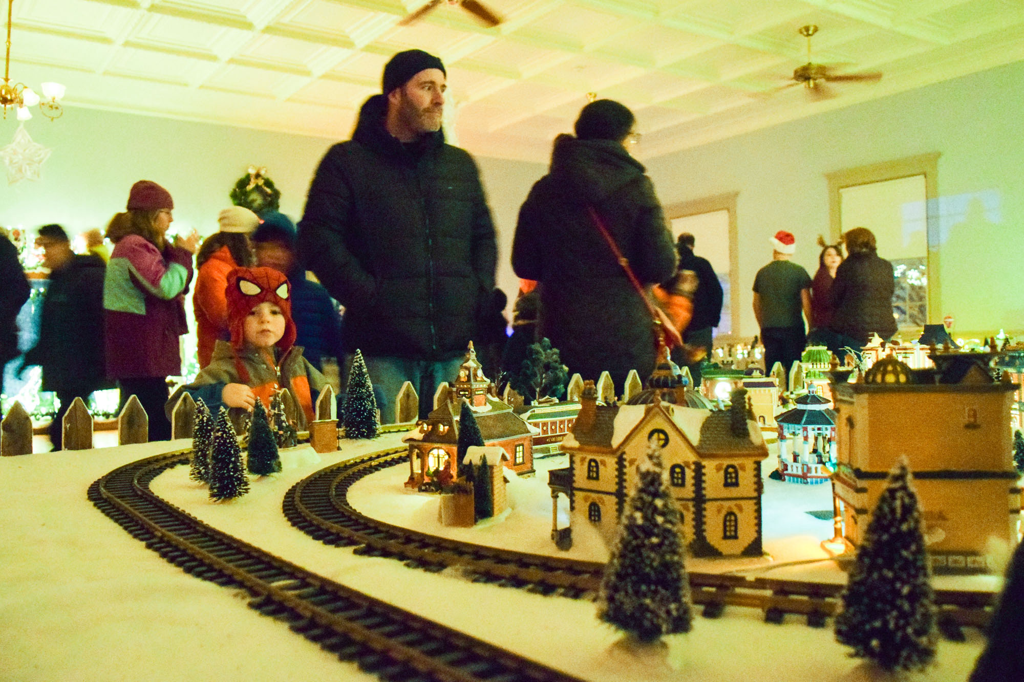 Sam Krueger , 3, of Plympton is mesmerized as the train goes by in the Halifax Town Hall at Holidays in Saturday Dec., 10.