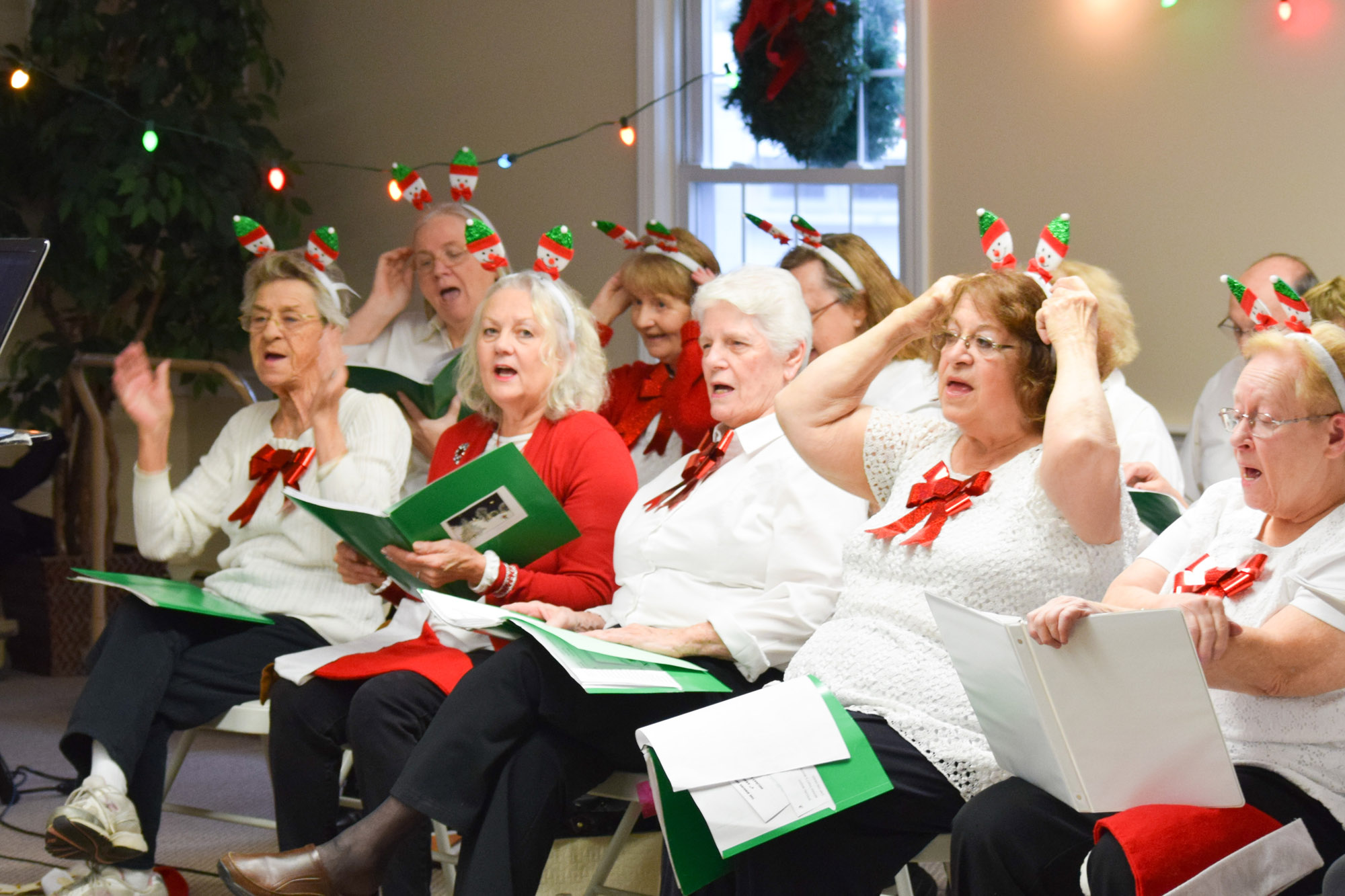 The Singing Seniors had slight ‘costume changes’, which included their holiday headbands and jingle bell props.