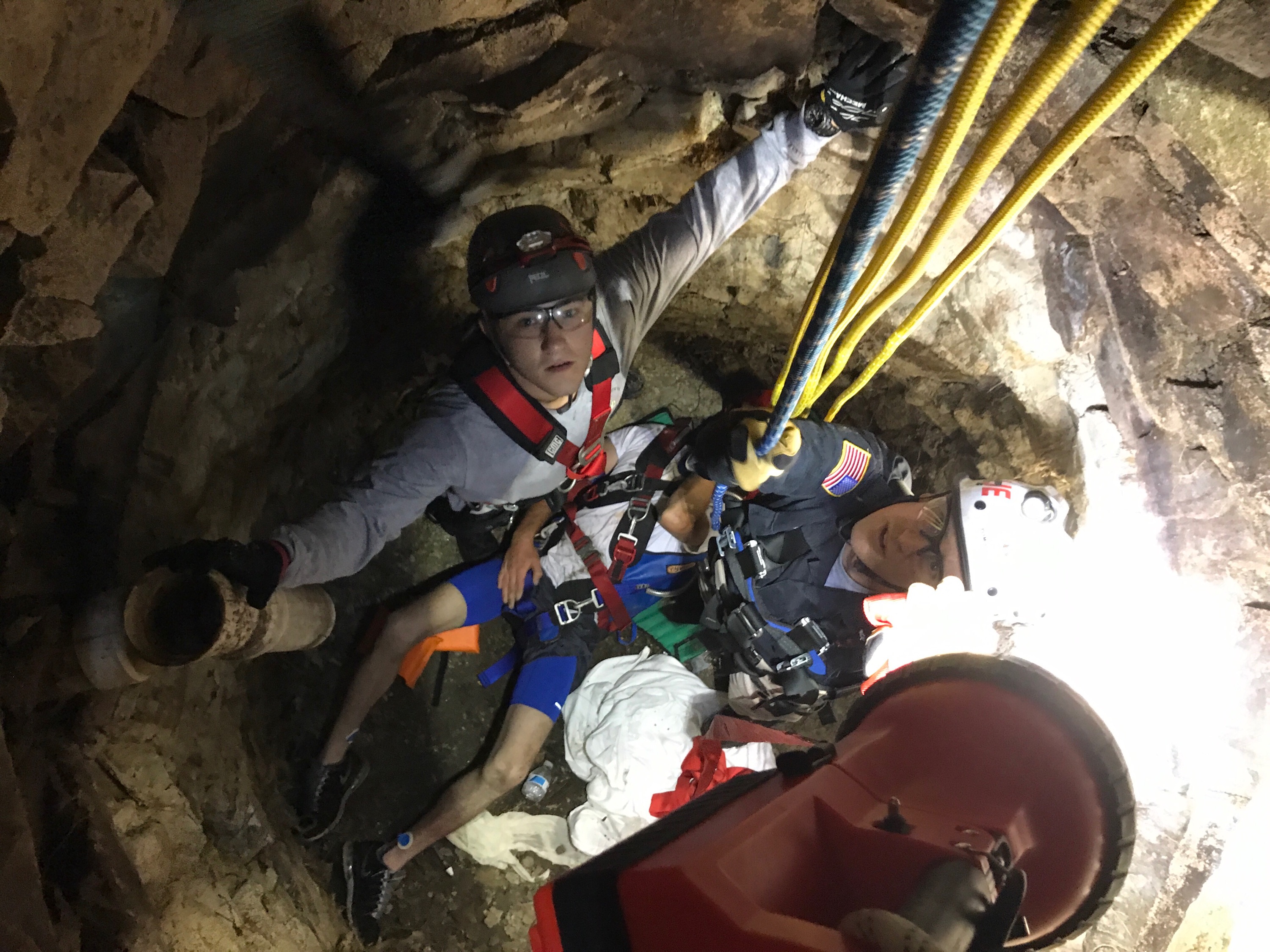 Halifax Firefighter Derek Coveny, a member of the Plymouth County Technical Rescue Team, throws his arms wide in the spirit of victory when they knew the rescue would end successfully.
